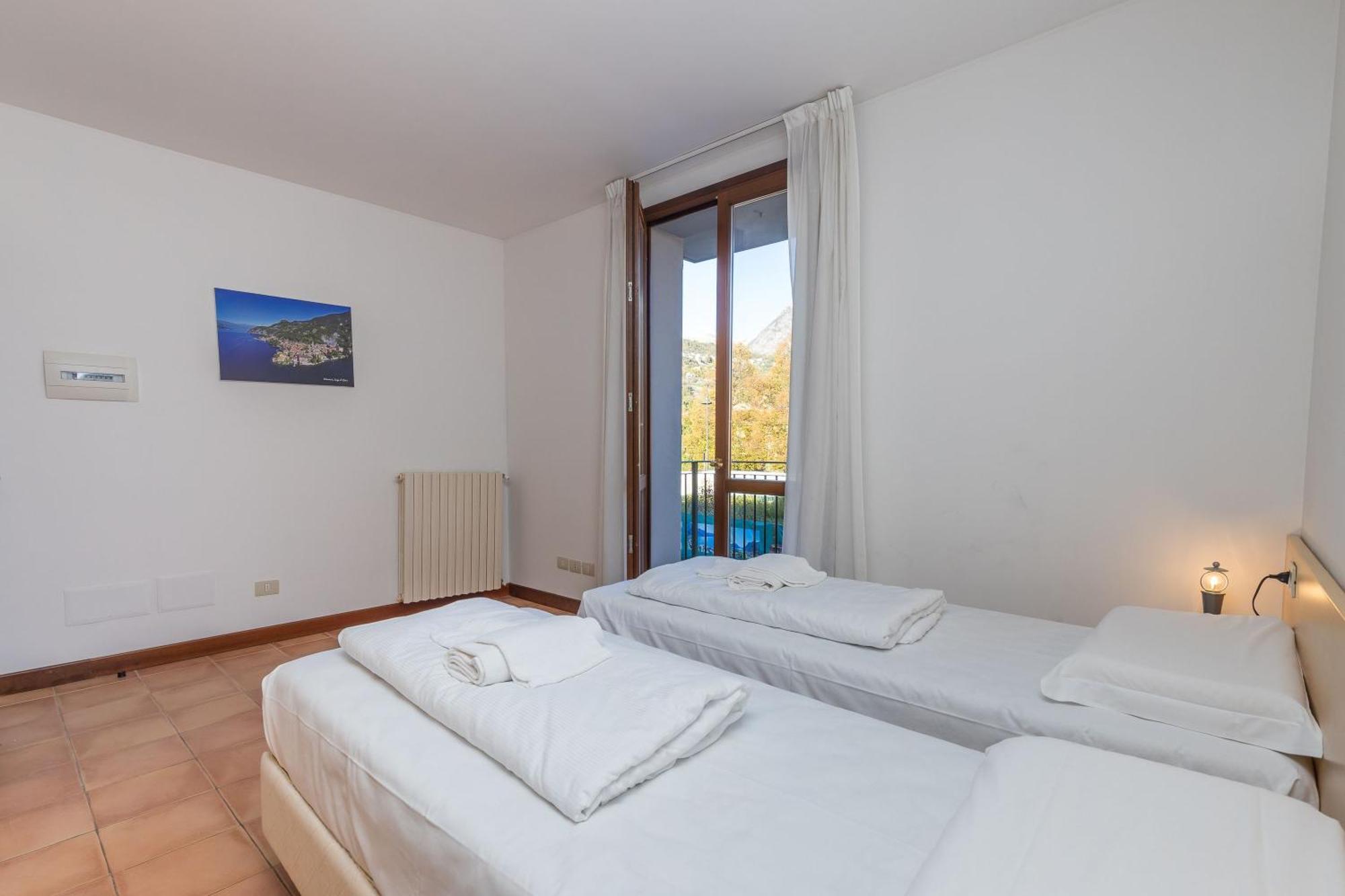 Residence Porto Letizia Porlezza Esterno foto